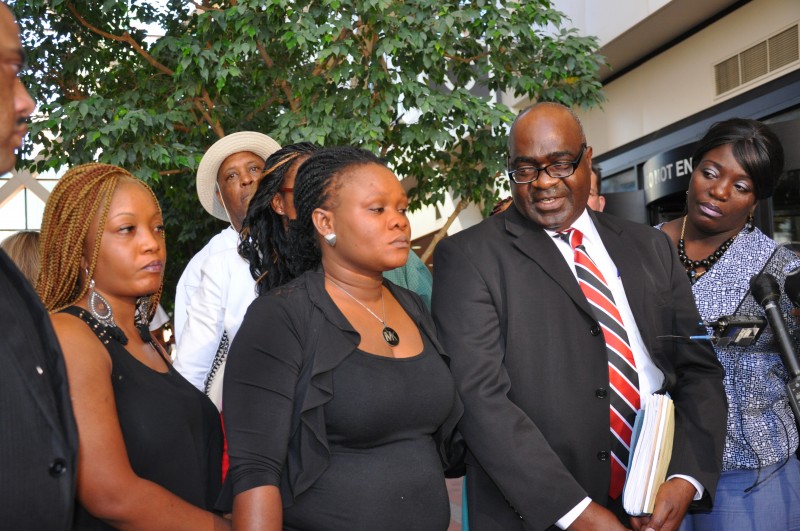 Karluah and her lawyer, Marcus Jarvis talk to the press. Photo: TheAfricaPaper/Issa Mansaray 