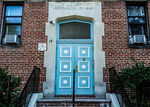 The entrance of the Handmaids’ historic convent on West 124th Street, opposite Marcus Garvey Park. Photo: Benjamin Parkin