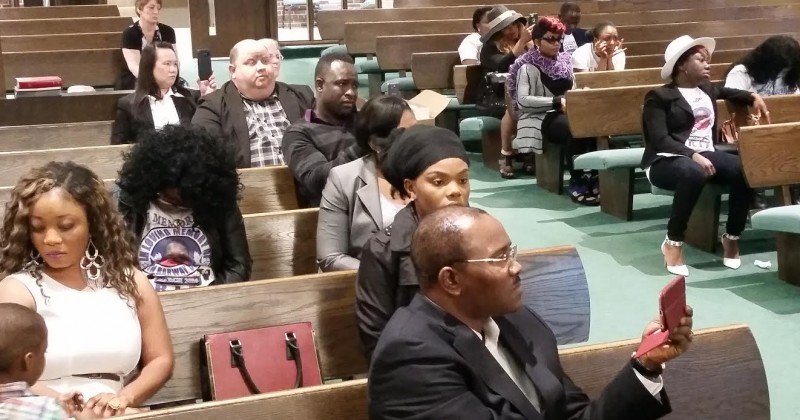 A view of the audience. Sitting second roll in left corner is Yamah Collins, stepmother of Barway Collins. Photo: The AfricaPaper/James Fasuekoi