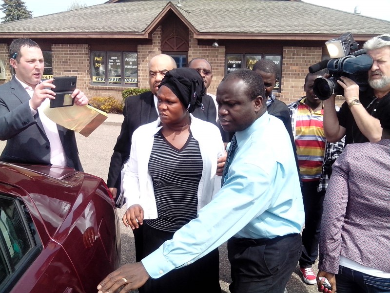 News crew follows Louise Karluah a day after she first arrived in Minnesota for her son's funeral in 2015. Photo: The AfricaPaper/James Fasuekoi