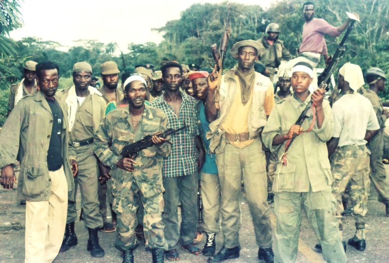 A mix of Mandingo-Krahn ULIMO rebel soldiers posed for a photo at their Po River guard post near Combat Camp. Photo: James K. Fasuekoi/The AfricaPaper