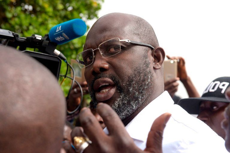 George Weah after casting his ballot in the second round of presidential elections in Monrovia, Liberia, on Tuesday. Credit Seyllou/Agence France-Presse — Getty Images