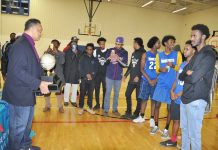 Rev. Jesse Jackson, Sr. gives trophy to winners - St. Paul. Photo: Issa Mansaray/The AfricaPaper