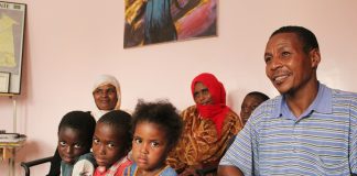 Mataala (far right) and his sister Choueida (far left) with her children in the offices of SOS Esclaves in Nouakchott. All of the family have escaped from slavery. Photo: Michael Hylton/MRG