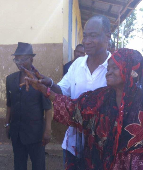 Dr. Samura Kamara and mother after voting in his village, Kamalo. Photo Abubakarr Kamara/The AfricaPaper