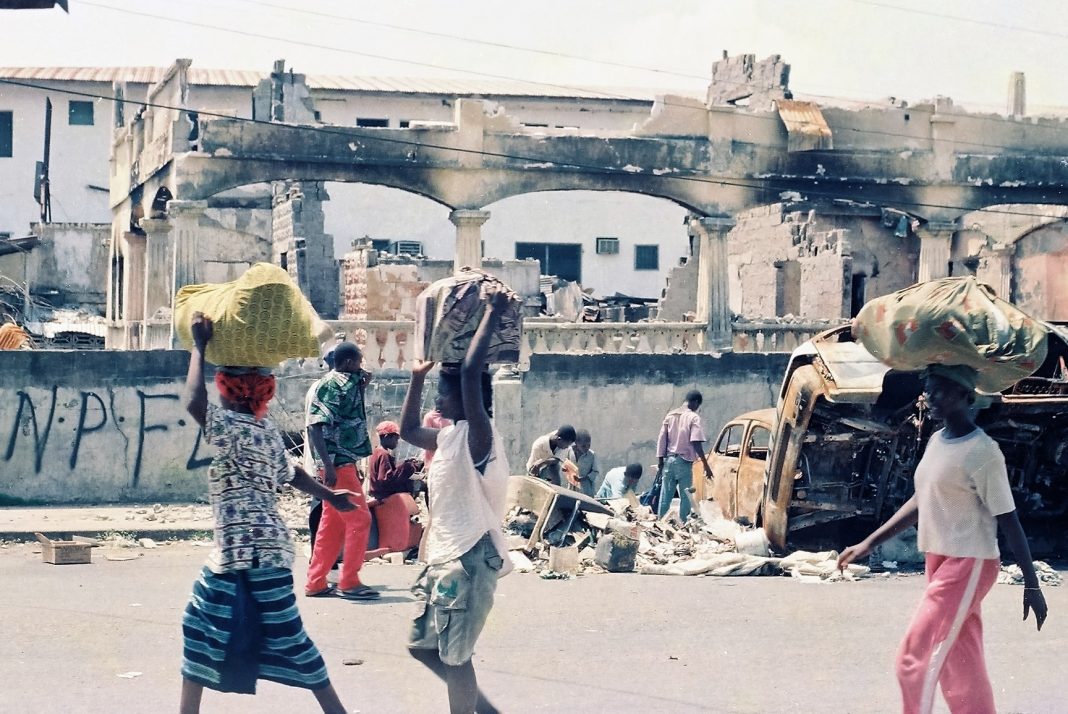 Civilians fled Monrovia as NPFL destroyed the city. Photo: James K. Fasuekoi/The AfricaPaper