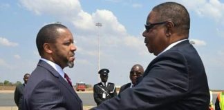 Welcome back home. Vice President Chilima (L) welcoming President Mutharika at Kamuzu International Airport from the United Nation Assembly. Photo Henry Mhango/The AfricaPaper