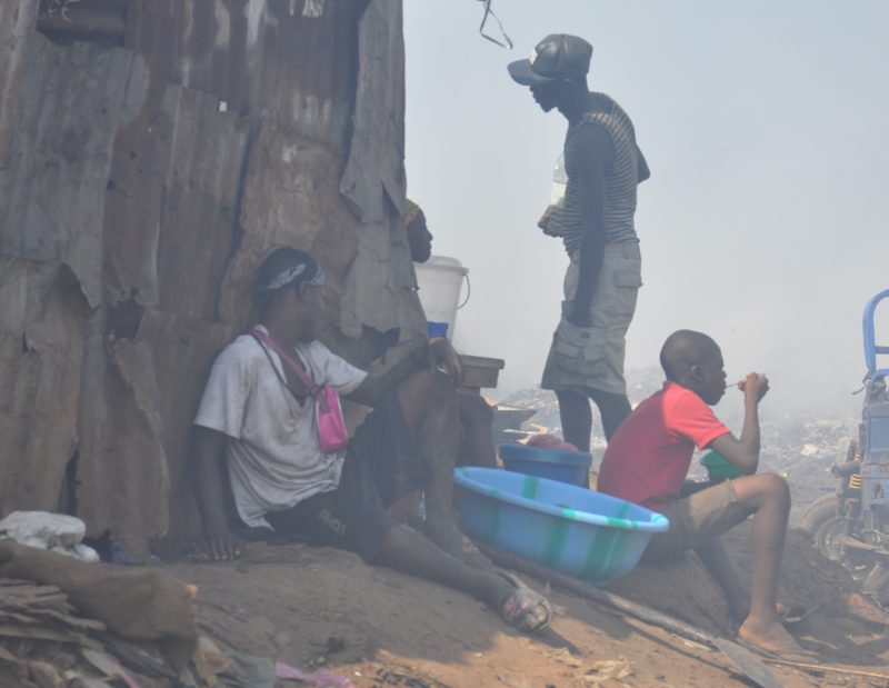Workers in a waste dump in Freetown, Sierra Leone. Photo: The AfricaPaper/Issa Mansaray