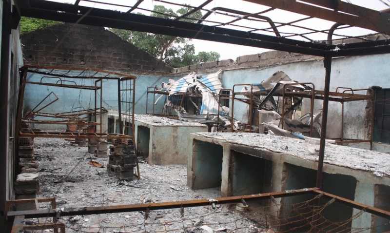 Bare bed frames fill the ruins of the school from which Boko Haram abducted over 200 schoolgirls. (Chika Oduah)