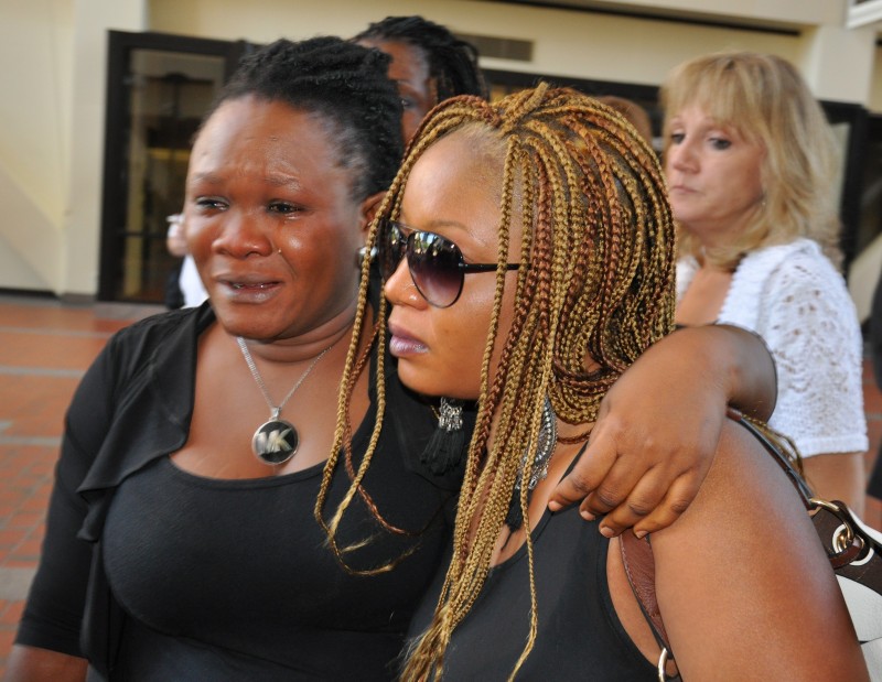 Louise Karluah (l) and Yamah Collins(R) wept in court. Photo: The AfricaPaper/Issa Mansaray