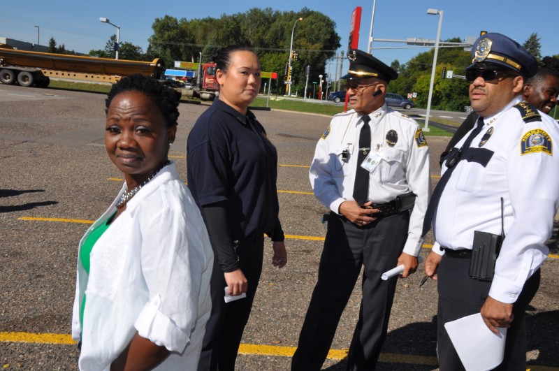 Search volunteer, Magdalene Menyongar (left) and David A. Singleton, Chief Executive Officer of Minnesota Community Policing Services (far right). Photo: (c) The AfricaPaper/Issa A. Mansaray 