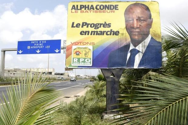  A vandalized billboard showing Alpha at the side of a highway in Dakar, on October 9, 2015 Seyllou Diallo, AFP  Read more: http://www.digitaljournal.com/news/world/tension-flares-in-guinea-ahead-of-presidential-poll/article/446088#ixzz3ongOMPiV
