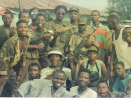A group of men in uniform posing for the camera.