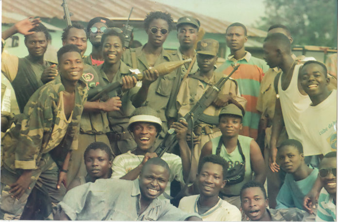 A group of men in uniform posing for the camera.